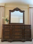 Magnussen 12 Drawer Dresser With Carved Mirror Wood. Fixed Price $1380.00.