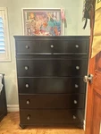 Black Wooden Ashley Furniture Five Drawer Chest Clothes Dresser. Fixed Price $200.00.